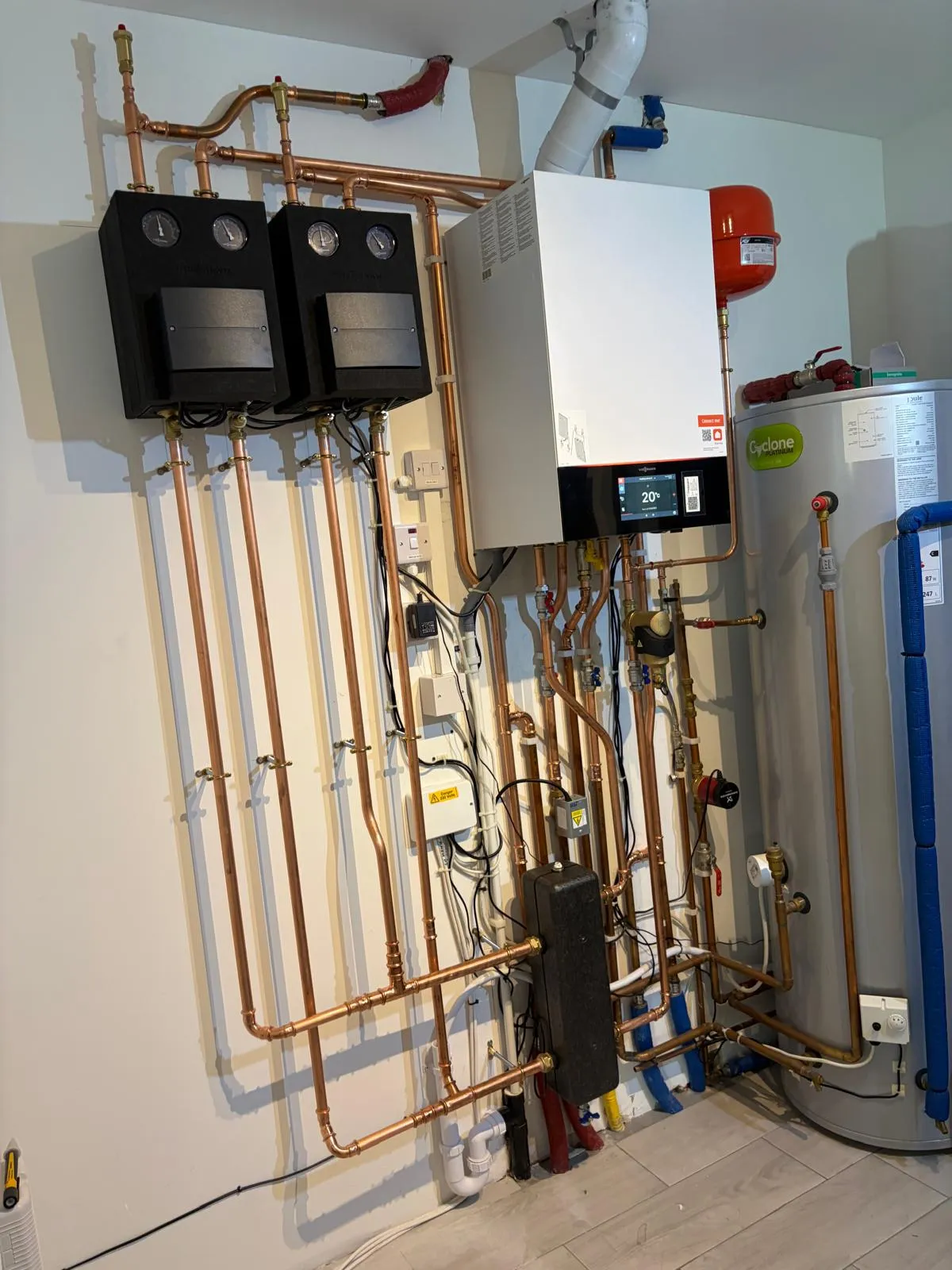 Viessmann 200-w System - Weather compensated, hot water priority, 2 Viessmann divicons heating circuits with mixers. Install Watford