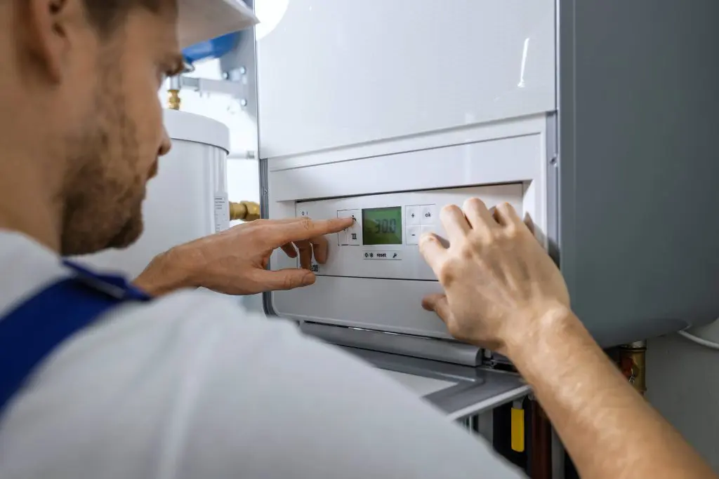 Plumber working on a boiler